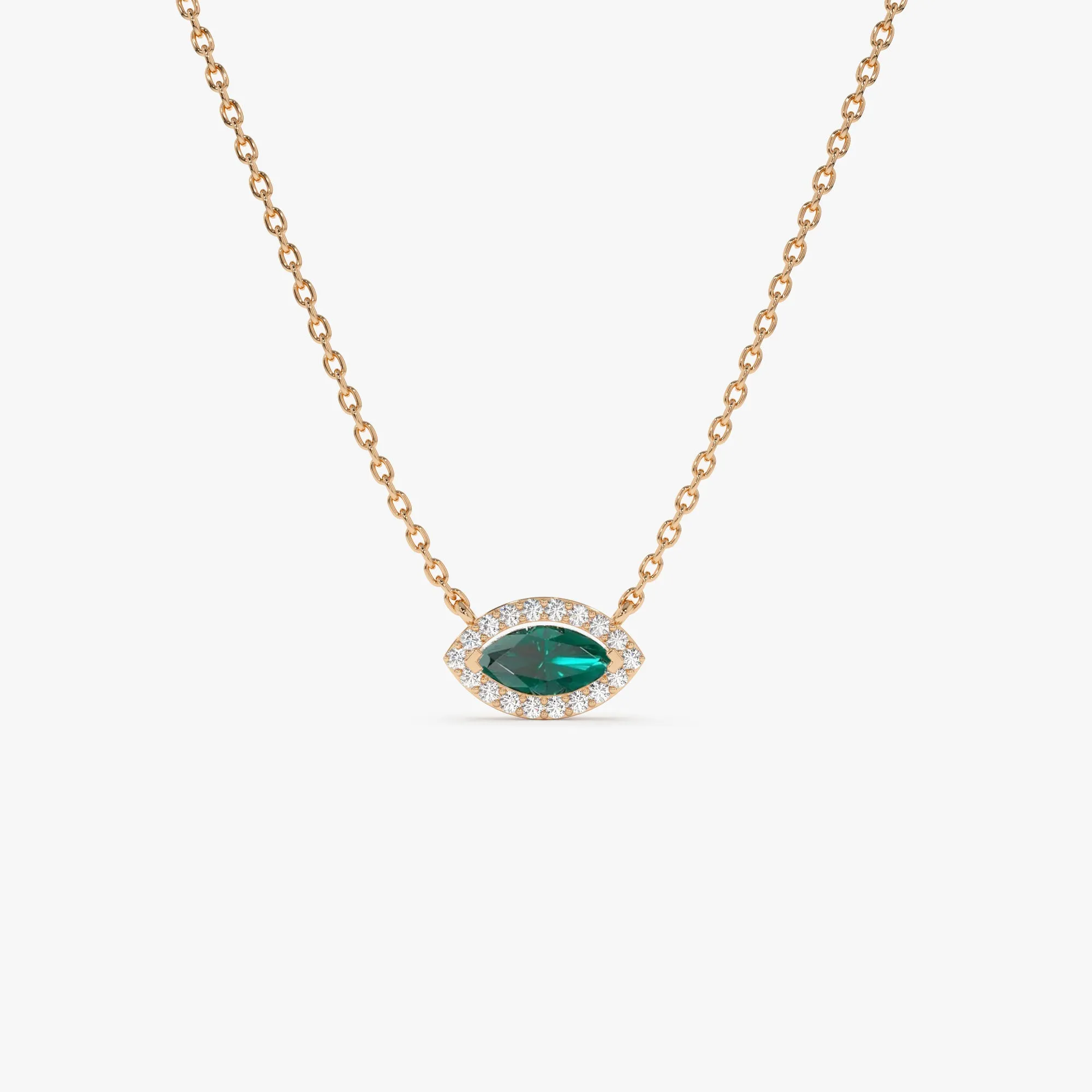 14k Marquise Emerald with Halo Diamond Setting