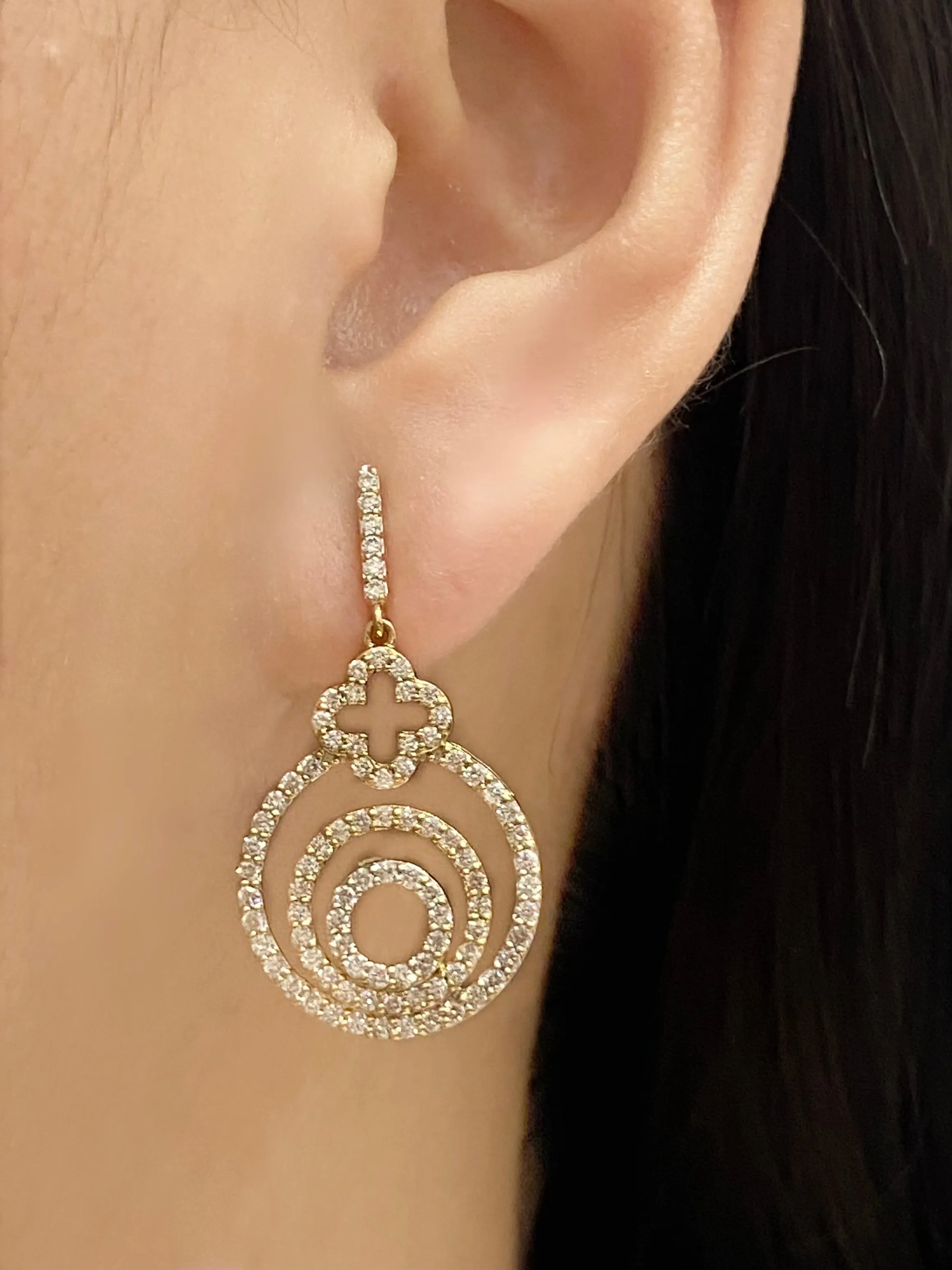 #LVNA2024 | Golden Round Halo Paved Dangling Diamond Earrings 18kt